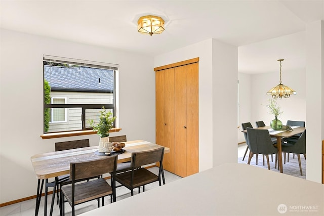 1708 Whatcom St, Bellingham, WA 98229 - dining space featuring baseboards and a chandelier