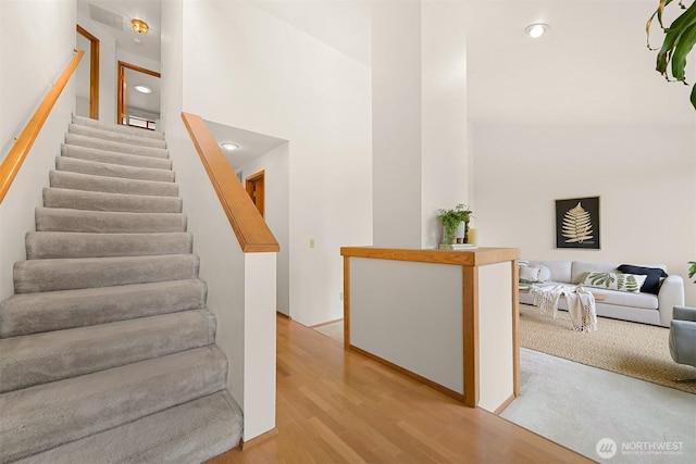 1708 Whatcom St, Bellingham, WA 98229 - staircase with wood finished floors and recessed lighting