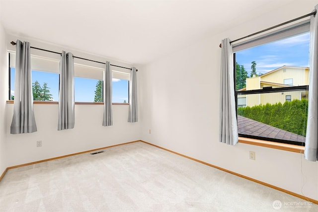 1708 Whatcom St, Bellingham, WA 98229 - carpeted empty room featuring plenty of natural light