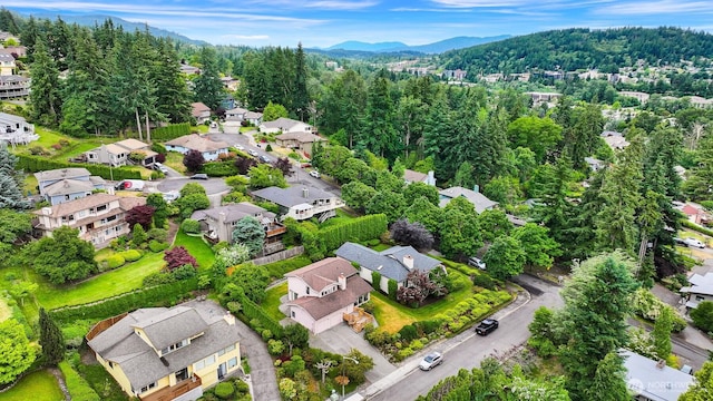1708 Whatcom St, Bellingham, WA 98229 - aerial view of property and surrounding area featuring a mountain backdrop and nearby suburban area