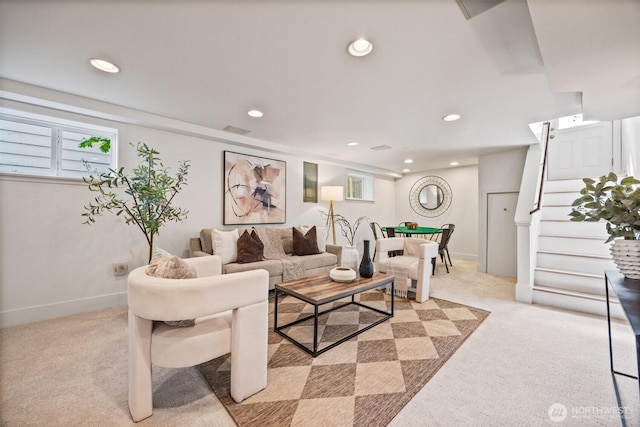 6543 12th Ave NW, Seattle, WA 98117 - living area featuring light colored carpet, recessed lighting, healthy amount of natural light, and stairway