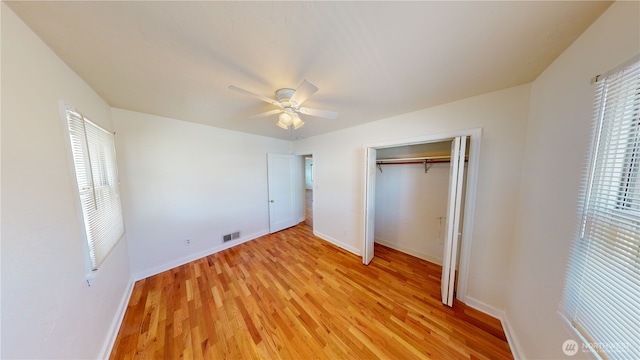 1303 Modoc, Walla Walla, WA 99362 - unfurnished bedroom featuring light wood-style floors, a closet, and ceiling fan