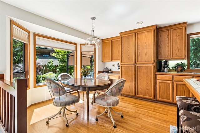 24131 SE 225th St, Maple Valley, WA 98038 - dining space featuring light wood-style floors and recessed lighting