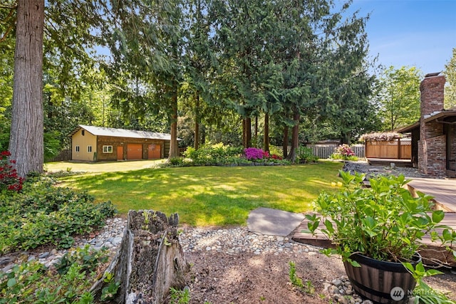 24131 SE 225th St, Maple Valley, WA 98038 - view of yard featuring a detached garage and an outbuilding