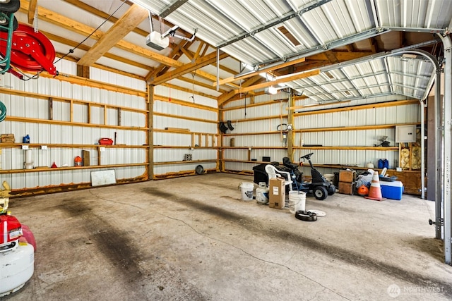 24131 SE 225th St, Maple Valley, WA 98038 - garage with a garage door opener and metal wall