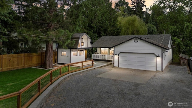 35728 157th Pl SE, Sultan, WA 98294 - view of front of property featuring an outbuilding, asphalt driveway, an attached garage, and roof with shingles