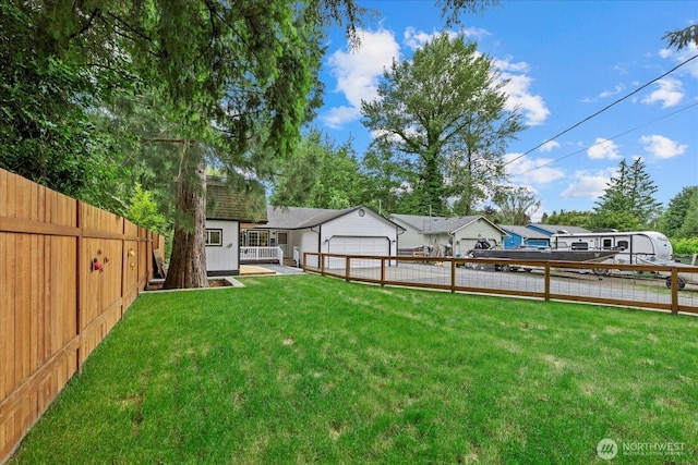 35728 157th Pl SE, Sultan, WA 98294 - fenced backyard with a garage