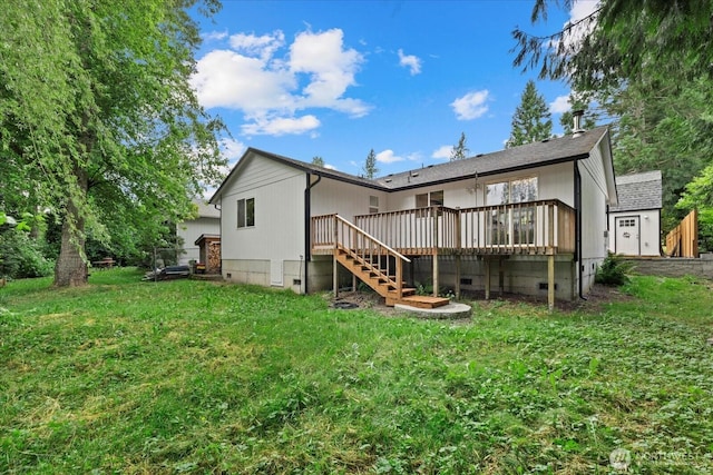 35728 157th Pl SE, Sultan, WA 98294 - rear view of house with stairway, a deck, crawl space, and a lawn