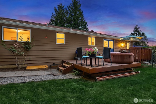 23318 3rd Pl W, Bothell, WA 98021 - back of house at dusk with a wooden deck and a lawn