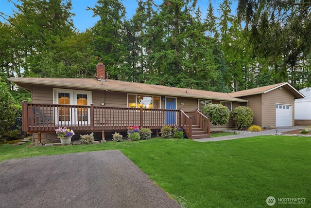 23318 3rd Pl W, Bothell, WA 98021 - ranch-style house featuring a chimney, a front lawn, and an attached garage