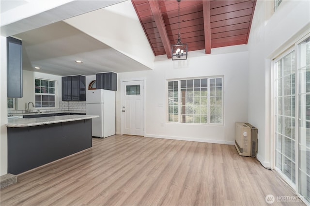 21405 Thompson Creek Rd SE, Tenino, WA 98589 - kitchen featuring freestanding refrigerator, light wood-style floors, healthy amount of natural light, wood ceiling, and recessed lighting