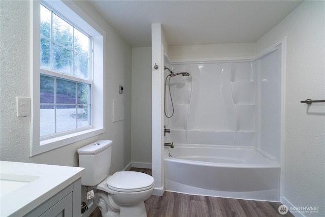 21405 Thompson Creek Rd SE, Tenino, WA 98589 - full bathroom with wood finished floors, vanity, and bathtub / shower combination