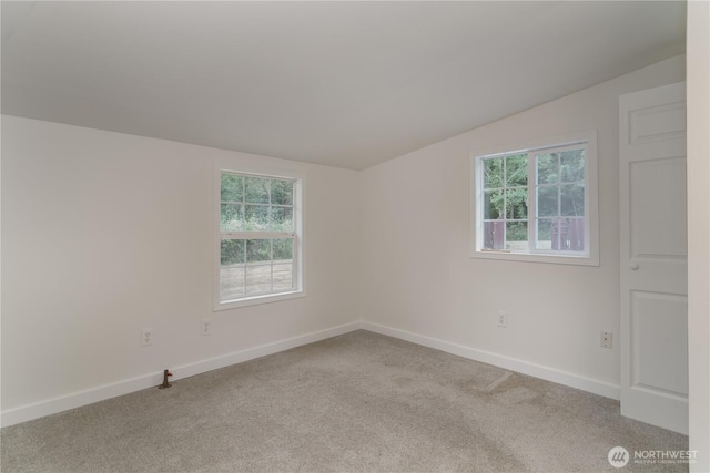21405 Thompson Creek Rd SE, Tenino, WA 98589 - carpeted spare room with vaulted ceiling and baseboards