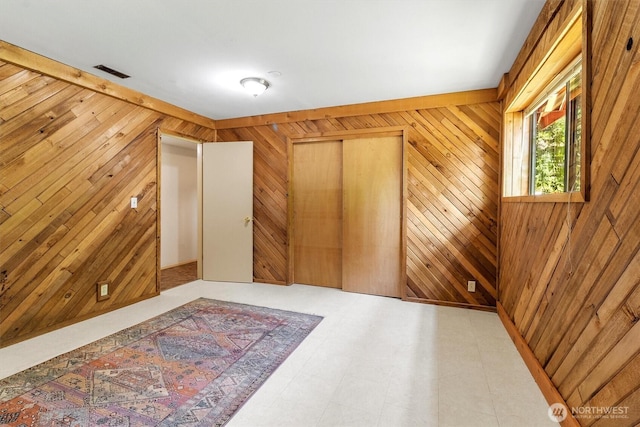 3909 Fielding Ave, Bellingham, WA 98229 - unfurnished bedroom with wooden walls and a closet