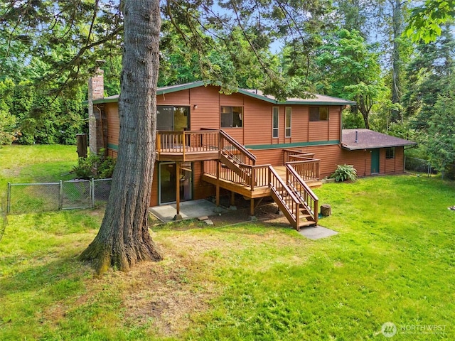 3909 Fielding Ave, Bellingham, WA 98229 - rear view of house featuring stairs, a deck, a gate, and a chimney