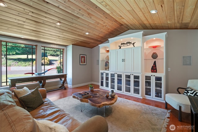 living area featuring vaulted ceiling, wood ceiling, recessed lighting, and wood finished floors