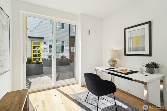 511 Howe St Unit C, Seattle, WA 98109 - home office featuring wood finished floors