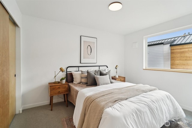 511 Howe St Unit C, Seattle, WA 98109 - carpeted bedroom featuring a closet and baseboards