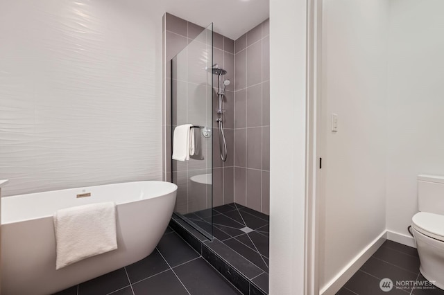 515 Howe St Unit C, Seattle, WA 98109 - bathroom featuring tile patterned flooring, a stall shower, and a soaking tub