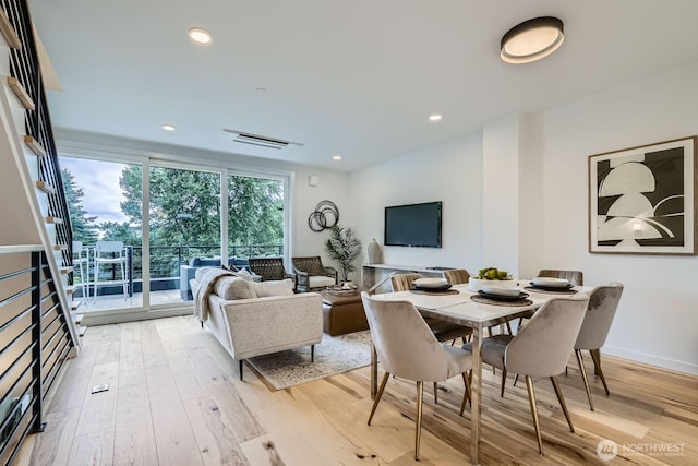 515 Howe St Unit C, Seattle, WA 98109 - dining space featuring light wood finished floors and recessed lighting