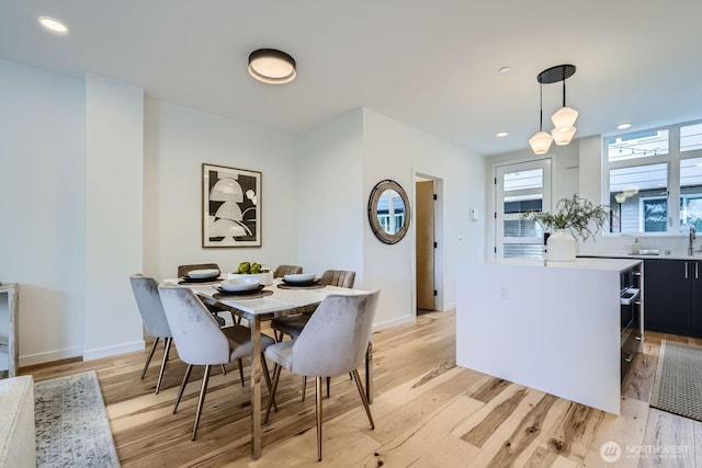 515 Howe St Unit C, Seattle, WA 98109 - dining area with light wood-style floors and recessed lighting
