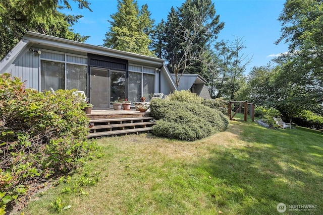 4925 Goodpiper Ln, Freeland, WA 98249 - back of property featuring a deck and a lawn