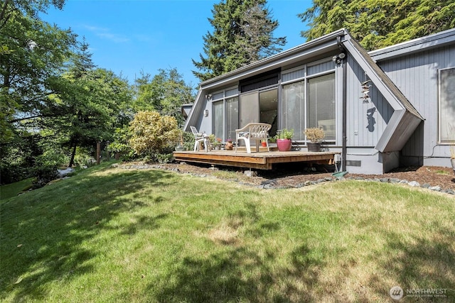4925 Goodpiper Ln, Freeland, WA 98249 - rear view of house with a wooden deck and a lawn