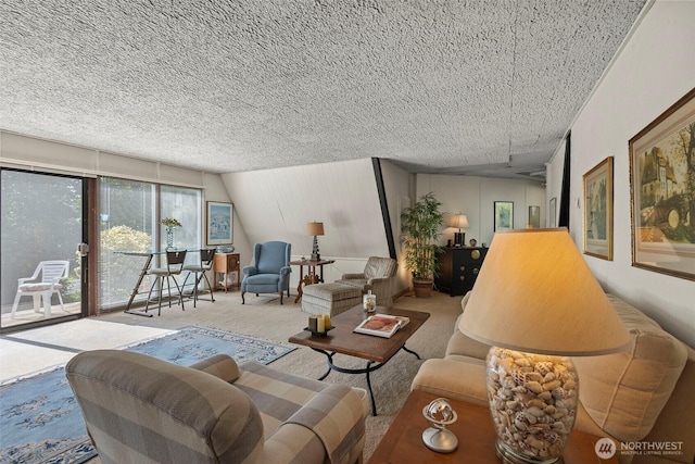 4925 Goodpiper Ln, Freeland, WA 98249 - carpeted living area with a textured ceiling