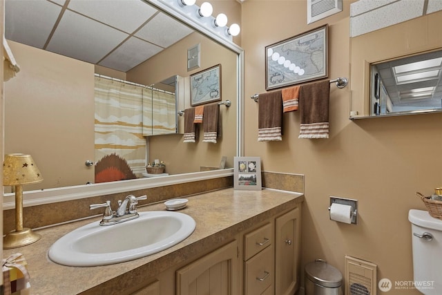 4925 Goodpiper Ln, Freeland, WA 98249 - full bathroom featuring vanity, a drop ceiling, and a shower with shower curtain