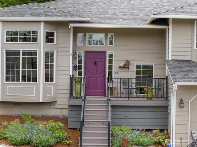 7123 NE 165th St, Kenmore, WA 98028 - doorway to property featuring roof with shingles