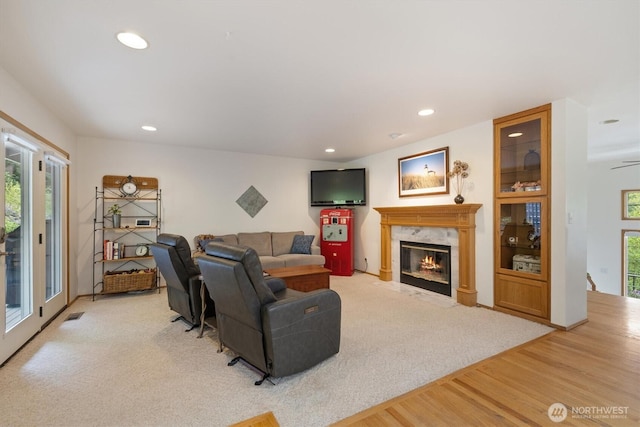 7123 NE 165th St, Kenmore, WA 98028 - living area featuring light wood-style floors, a high end fireplace, and recessed lighting