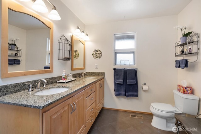 7123 NE 165th St, Kenmore, WA 98028 - bathroom featuring double vanity and tile patterned flooring