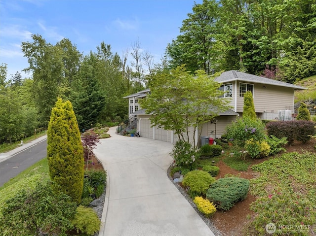 7123 NE 165th St, Kenmore, WA 98028 - view of front of home with concrete driveway