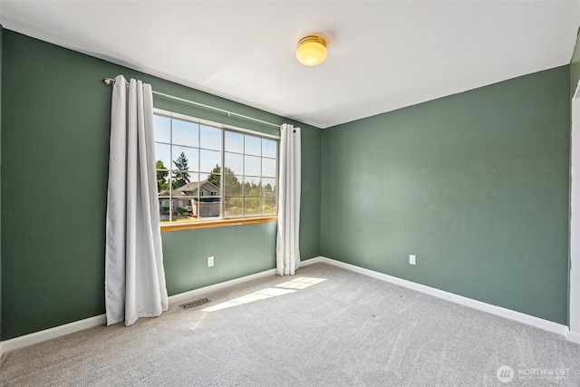 9812 S 247th Ct, Kent, WA 98030 - spare room featuring carpet flooring and baseboards