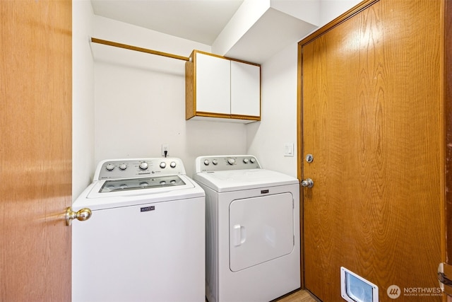 9812 S 247th Ct, Kent, WA 98030 - laundry area featuring cabinet space and washing machine and clothes dryer