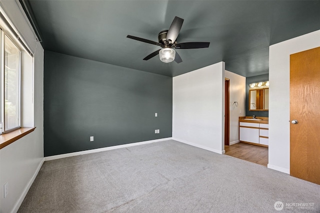 9812 S 247th Ct, Kent, WA 98030 - unfurnished bedroom with carpet, connected bathroom, and a ceiling fan