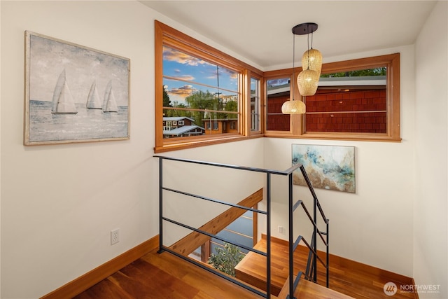 2339 Fairview Ave E Unit L, Seattle, WA 98102 - staircase with baseboards and wood finished floors