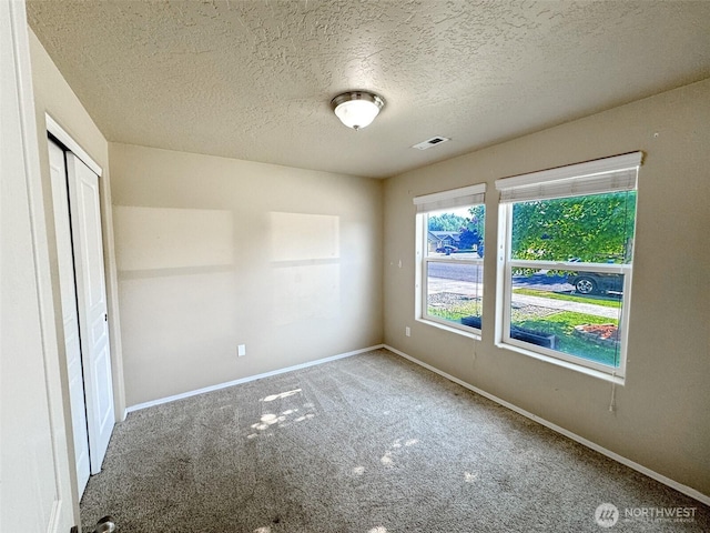 314 SW Homestead, College Place, WA 99324 - spare room with carpet and a textured ceiling
