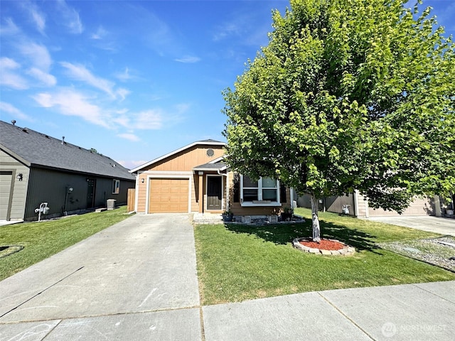 314 SW Homestead, College Place, WA 99324 - view of front facade with concrete driveway, a garage, and a front yard