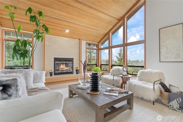 4811 Somerset Dr SE, Bellevue, WA 98006 - living room with a tiled fireplace, lofted ceiling, wood ceiling, and a wall of windows