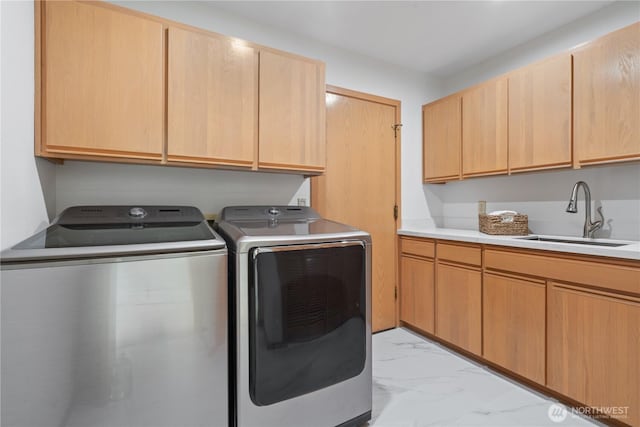 4811 Somerset Dr SE, Bellevue, WA 98006 - washroom featuring light marble finish flooring, independent washer and dryer, and cabinet space