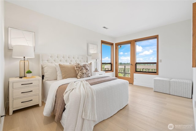 4811 Somerset Dr SE, Bellevue, WA 98006 - bedroom featuring light wood finished floors and access to exterior