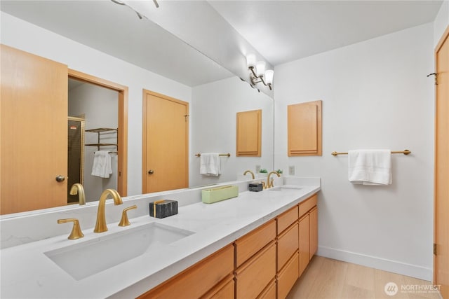 4811 Somerset Dr SE, Bellevue, WA 98006 - full bath featuring double vanity, an enclosed shower, and wood finished floors