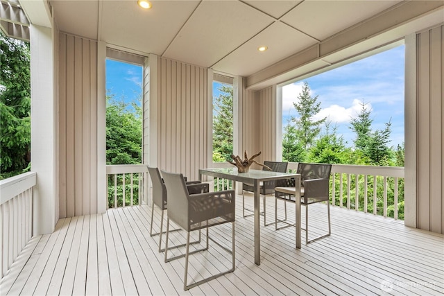 4811 Somerset Dr SE, Bellevue, WA 98006 - sunroom / solarium featuring wood-type flooring and plenty of natural light