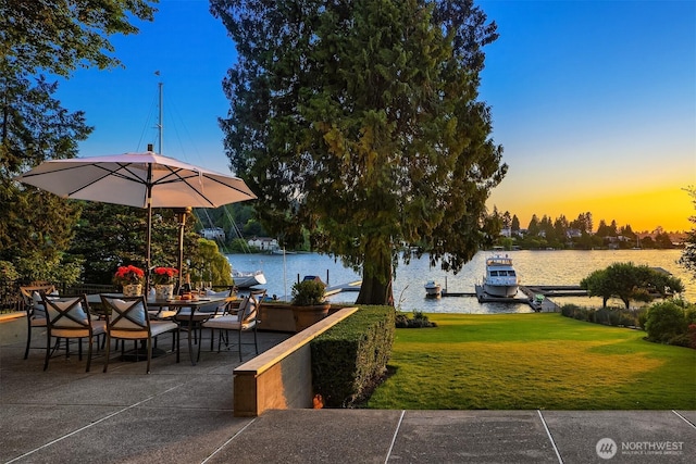 3611 Hunts Point Rd, Hunts Point, WA 98004 - patio terrace at dusk with a water view, a yard, and a patio