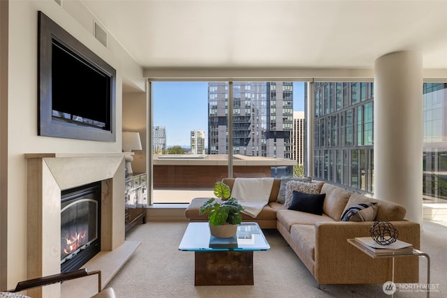 10610 NE 9th Pl Unit 1220, Bellevue, WA 98004 - living area with a high end fireplace, carpet floors, and plenty of natural light