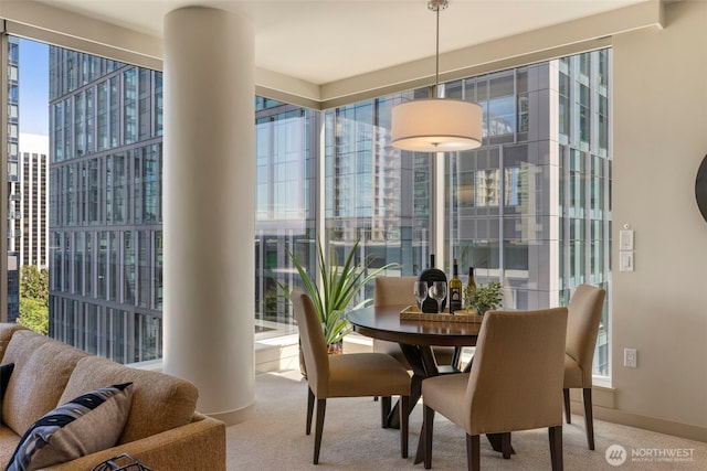 10610 NE 9th Pl Unit 1220, Bellevue, WA 98004 - dining room featuring carpet floors and baseboards