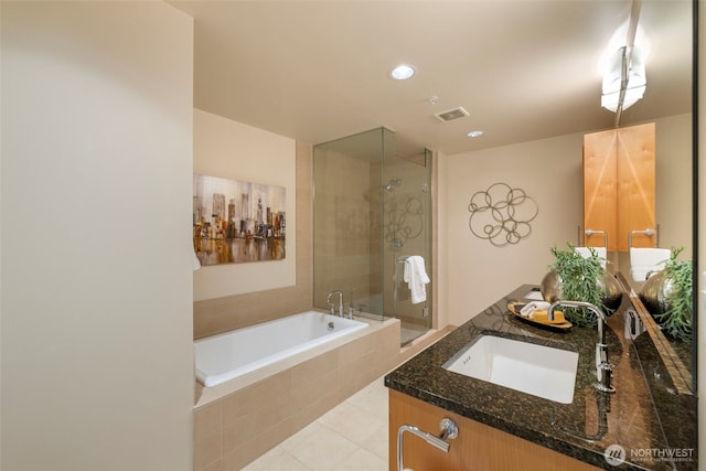 10610 NE 9th Pl Unit 1220, Bellevue, WA 98004 - full bathroom with vanity, tiled shower, a garden tub, tile patterned flooring, and recessed lighting