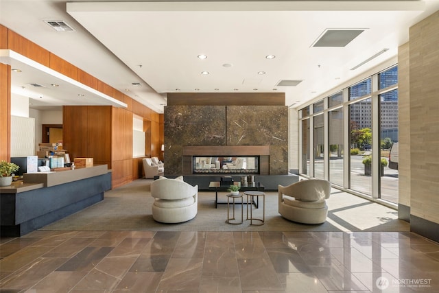 10610 NE 9th Pl Unit 1220, Bellevue, WA 98004 - lobby featuring wooden walls and recessed lighting