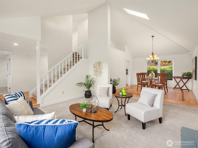 13063 SE 47th Pl, Bellevue, WA 98006 - living room featuring high vaulted ceiling, stairs, a chandelier, light wood-type flooring, and a skylight